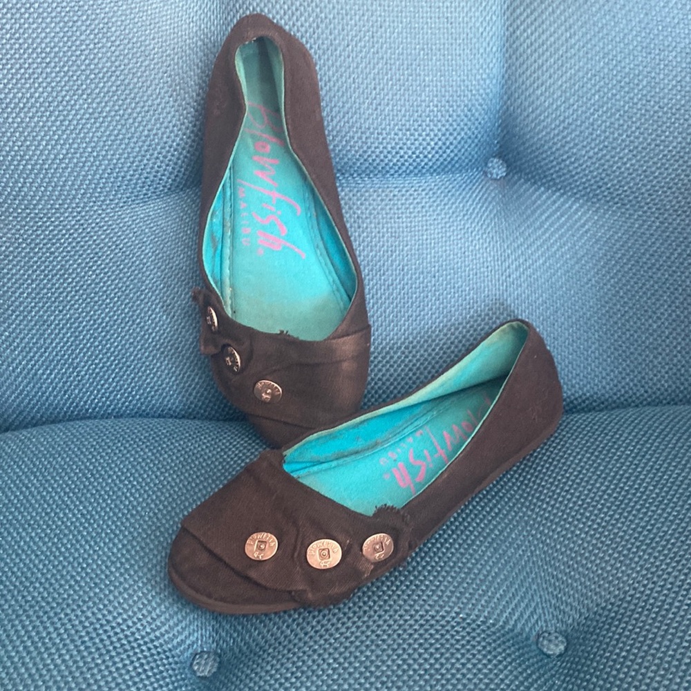 Slip on, black flats.